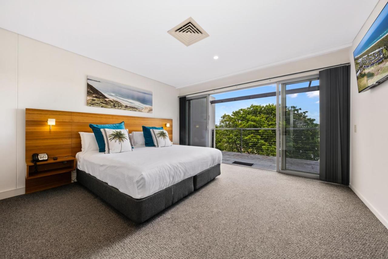 Pullman Magenta Shores Resort Entrance Luaran gambar A bedroom at the hotel