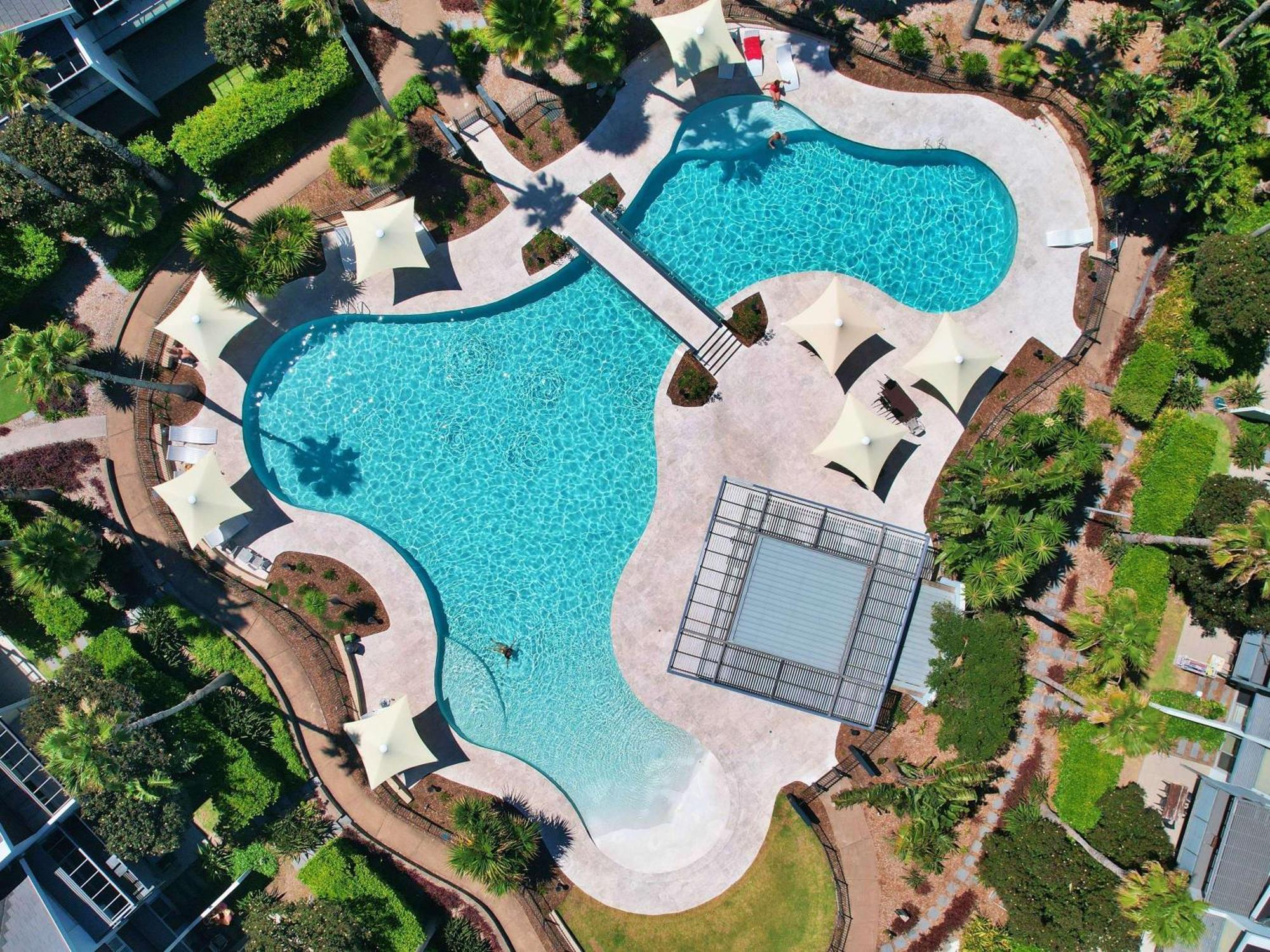 Pullman Magenta Shores Resort Entrance Luaran gambar Aerial view of the pool